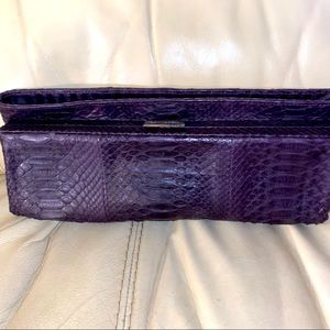 Devi Kroell purple snakeskin clutch